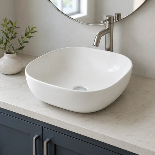 Soft square ceramic vessel sink installed in a styled bathroom — lifestyle scene, SANIKB SN159.