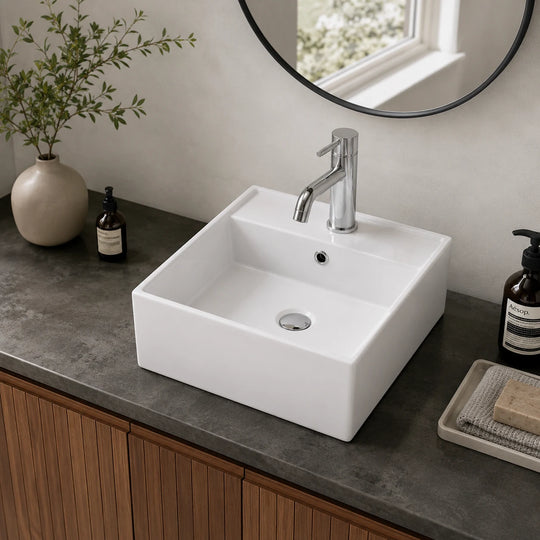 Square ceramic countertop basin installed in a styled bathroom — lifestyle scene, SANIKB SN109-019.