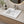 Square ceramic vanity sink installed in a styled bathroom — lifestyle scene, SANIKB SN1546.