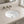 Undermount bathroom sink installed in a styled bathroom — lifestyle scene, SANIKB SN005.