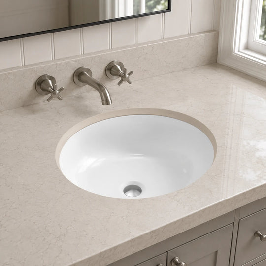 Undermount bathroom sink installed in a styled bathroom — lifestyle scene, SANIKB SN005.