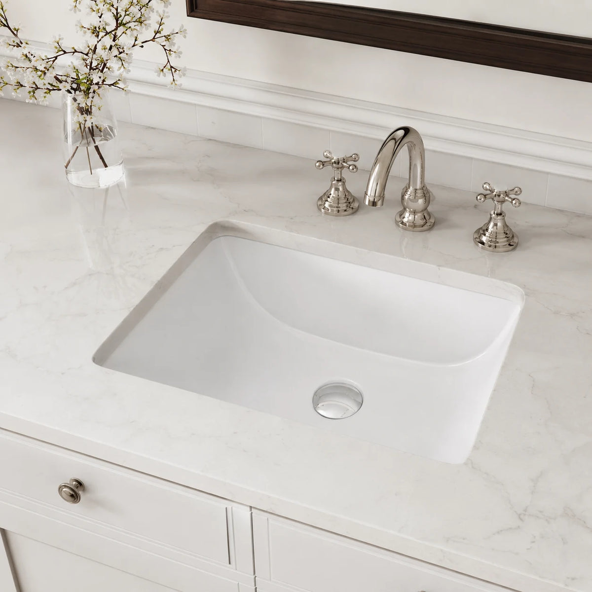 Undermount bathroom sink installed in a styled bathroom — lifestyle scene, SANIKB SN015.