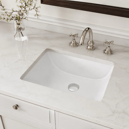 Undermount bathroom sink installed in a styled bathroom — lifestyle scene, SANIKB SN015.