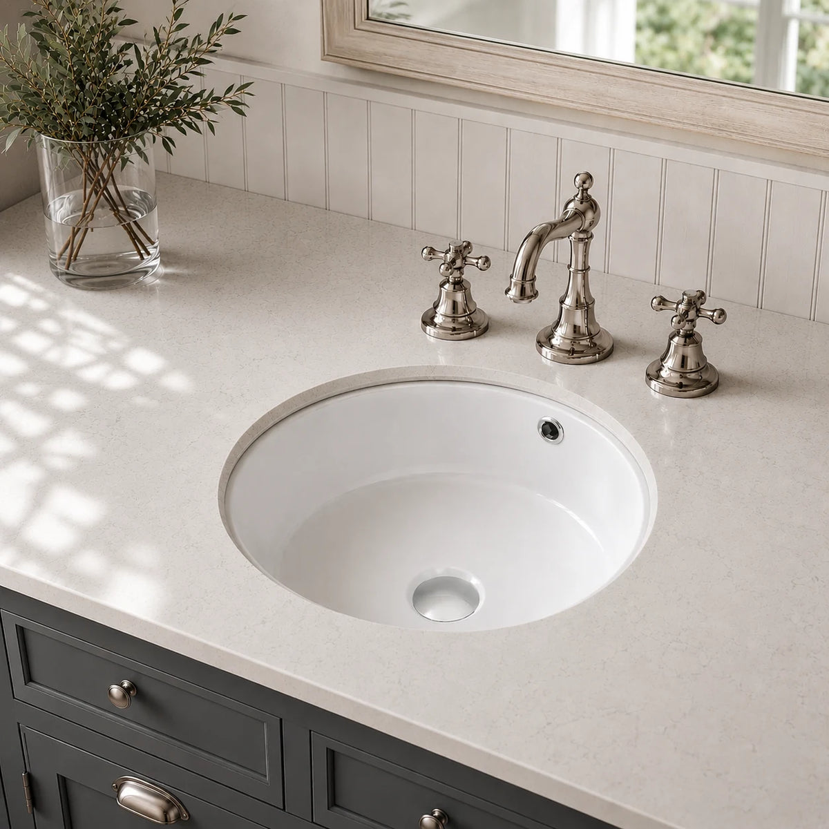 Undermount bathroom sink installed in a styled bathroom — lifestyle scene, SANIKB SN038.